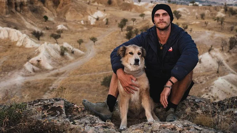 Man with dog outdoors