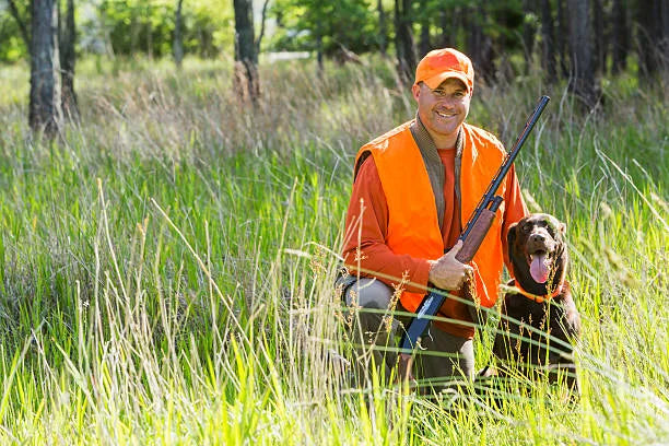 Hunter with retriever